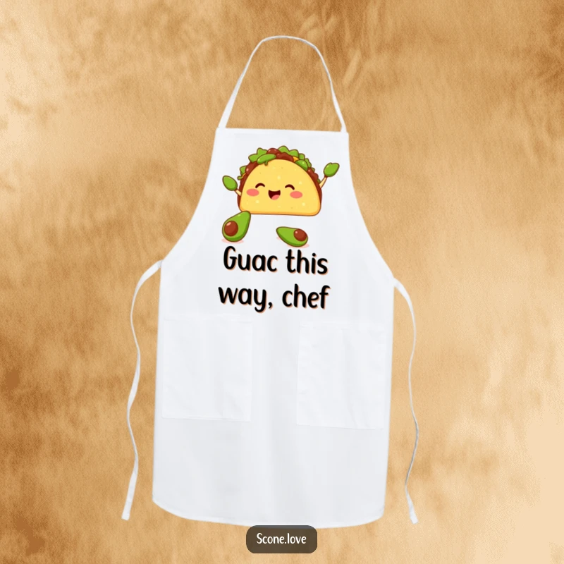 Funny apron featuring a happy taco juggling tiny avocados with its shell, perfect for a festive and fun cooking experience.