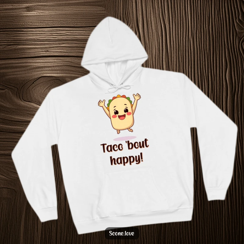 Funny Hoodie: A smiling taco leaping joyfully with arms up, offering warmth, comfort, and a sprinkle of festive fun.