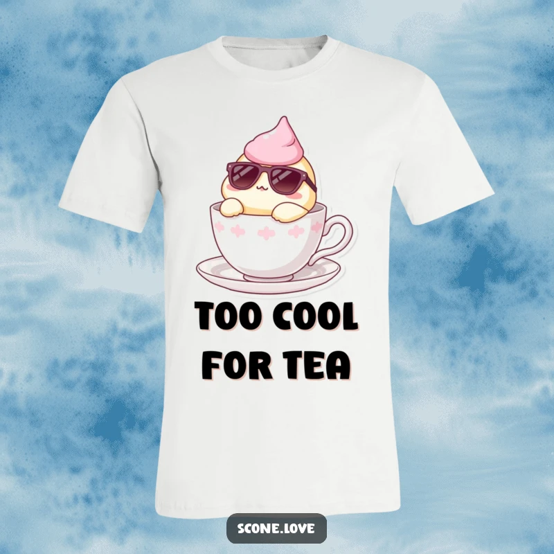 Funny t-shirt with a scone wearing sunglasses, lounging in a teacup, representing ultimate cool and relaxation.