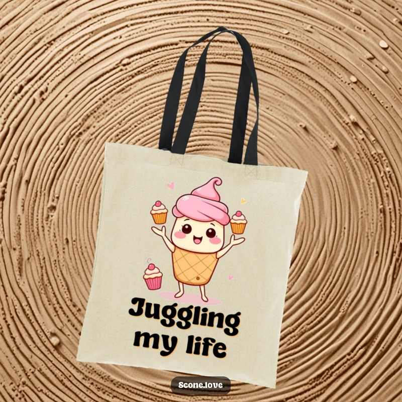 Funny Kawaii Scone Juggling Tote Bag: A scone juggles mini cupcakes with energetic movement, a fun accessory.