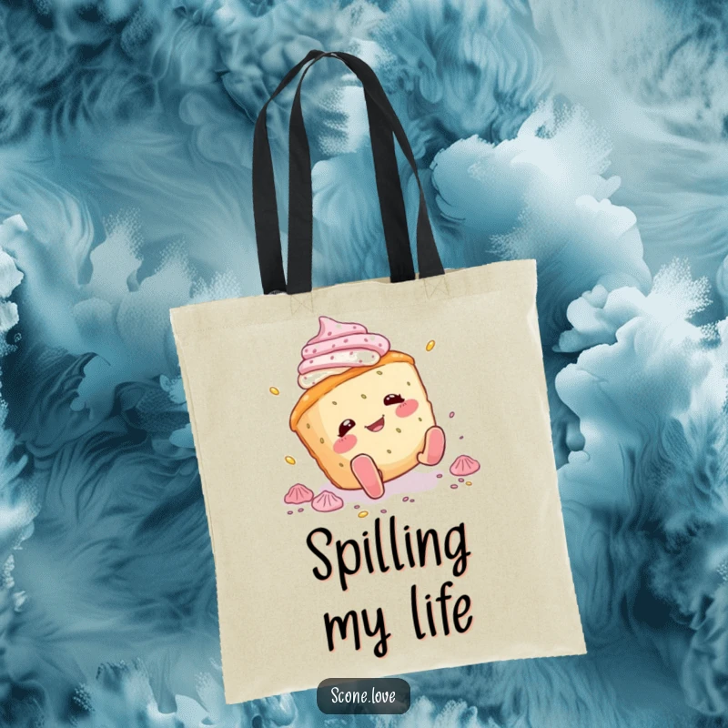 Funny scone tote bag showing a scone character tripping and scattering icing, great for groceries or carrying everyday items with humor.